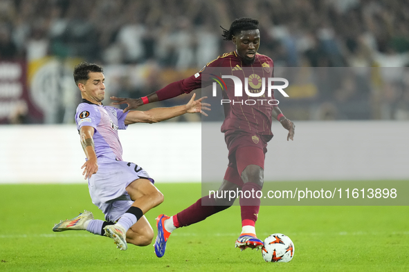 Manu Kone central midfield of Roma and France and Benat Prados central midfield of Athletic Club and Spain compete for the ball during the U...