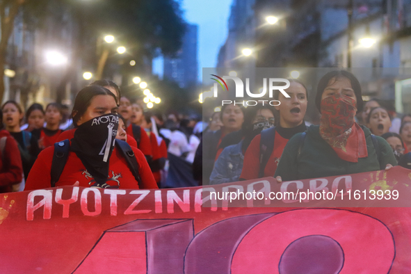 Rural students participate in a protest in support of the parents of the rural student victims to demand justice during the 10th anniversary...