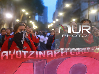 Rural students participate in a protest in support of the parents of the rural student victims to demand justice during the 10th anniversary...