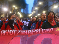 Rural students participate in a protest in support of the parents of the rural student victims to demand justice during the 10th anniversary...