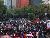 Demonstrators take part in a protest in support of the parents of the rural student victims to demand justice during the 10th anniversary of...