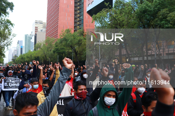 Rural students participate in a protest in support of the parents of the rural student victims to demand justice during the 10th anniversary...