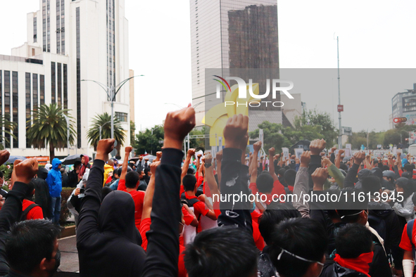 Rural students participate in a protest in support of the parents of the rural student victims to demand justice during the 10th anniversary...