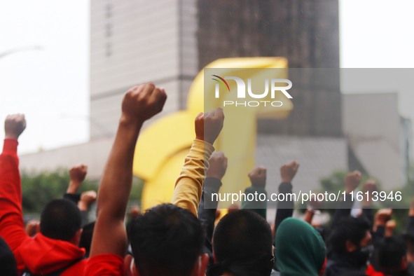 Rural students participate in a protest in support of the parents of the rural student victims to demand justice during the 10th anniversary...