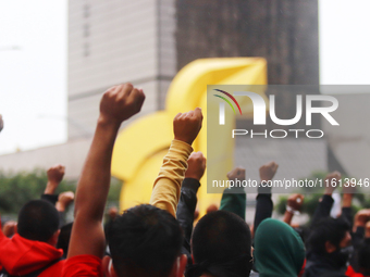 Rural students participate in a protest in support of the parents of the rural student victims to demand justice during the 10th anniversary...