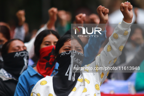 Rural students participate in a protest in support of the parents of the rural student victims to demand justice during the 10th anniversary...