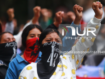 Rural students participate in a protest in support of the parents of the rural student victims to demand justice during the 10th anniversary...