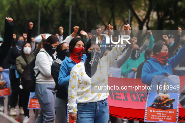 Rural students participate in a protest in support of the parents of the rural student victims to demand justice during the 10th anniversary...