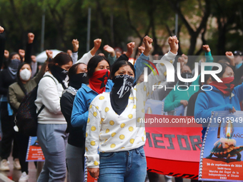 Rural students participate in a protest in support of the parents of the rural student victims to demand justice during the 10th anniversary...