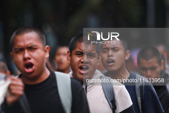 Rural students participate in a protest in support of the parents of the rural student victims to demand justice during the 10th anniversary...