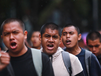 Rural students participate in a protest in support of the parents of the rural student victims to demand justice during the 10th anniversary...