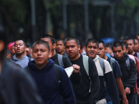 Rural students participate in a protest in support of the parents of the rural student victims to demand justice during the 10th anniversary...