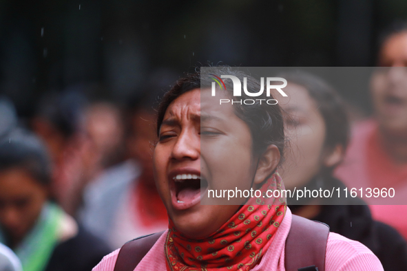 A rural student takes part in a protest in support of the parents of the rural student victims to demand justice during the 10th anniversary...