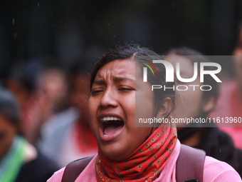 A rural student takes part in a protest in support of the parents of the rural student victims to demand justice during the 10th anniversary...