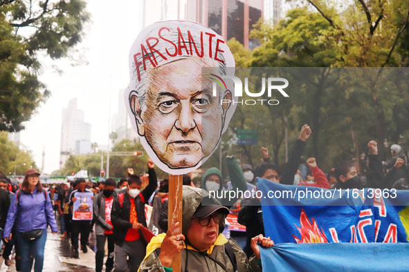 Rural students participate in a protest in support of the parents of the rural student victims to demand justice during the 10th anniversary...