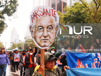 Rural students participate in a protest in support of the parents of the rural student victims to demand justice during the 10th anniversary...