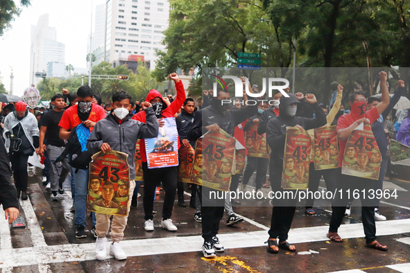 Rural students participate in a protest in support of the parents of the rural student victims to demand justice during the 10th anniversary...