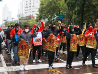 Rural students participate in a protest in support of the parents of the rural student victims to demand justice during the 10th anniversary...