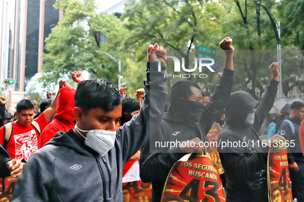 Rural students participate in a protest in support of the parents of the rural student victims to demand justice during the 10th anniversary...