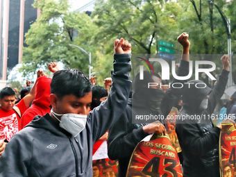 Rural students participate in a protest in support of the parents of the rural student victims to demand justice during the 10th anniversary...