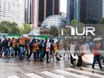 Rural students participate in a protest in support of the parents of the rural student victims to demand justice during the 10th anniversary...