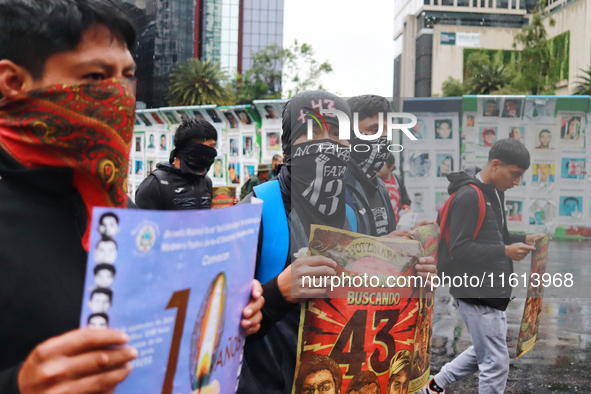 Rural students participate in a protest in support of the parents of the rural student victims to demand justice during the 10th anniversary...