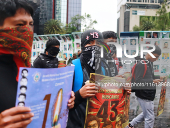 Rural students participate in a protest in support of the parents of the rural student victims to demand justice during the 10th anniversary...