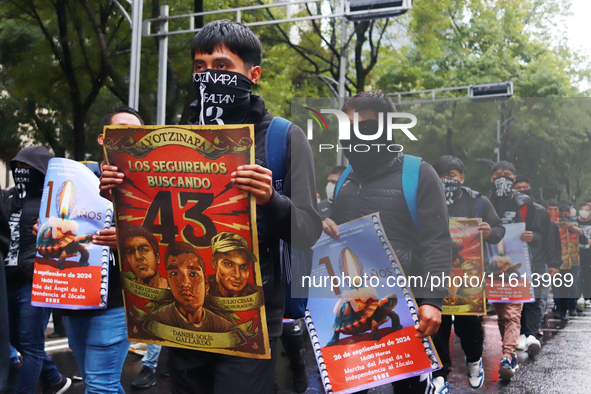 Rural students participate in a protest in support of the parents of the rural student victims to demand justice during the 10th anniversary...