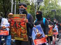 Rural students participate in a protest in support of the parents of the rural student victims to demand justice during the 10th anniversary...