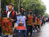 Rural students participate in a protest in support of the parents of the rural student victims to demand justice during the 10th anniversary...