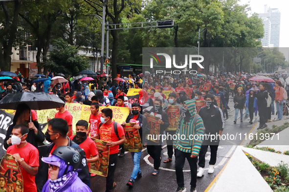 Rural students participate in a protest in support of the parents of the rural student victims to demand justice during the 10th anniversary...