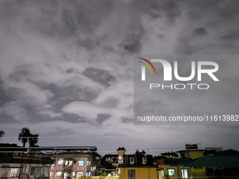 Dark rain clouds appear on the skyline in Siliguri, India, on September 27, 2024. Four people die due to a thunderstorm and lightning in the...