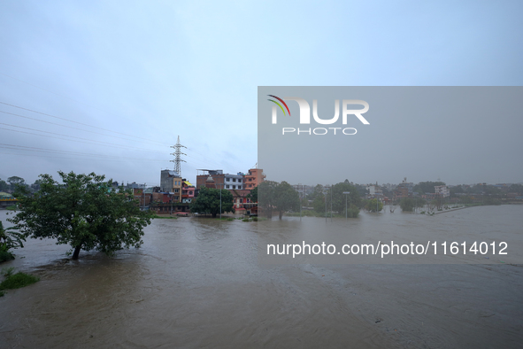 The swollen Bagmati River inundates areas across Kathmandu, Nepal, following incessant rainfall on August 27, 2024. The Himalayan nation wit...