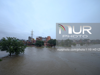 The swollen Bagmati River inundates areas across Kathmandu, Nepal, following incessant rainfall on August 27, 2024. The Himalayan nation wit...