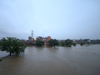 The swollen Bagmati River inundates areas across Kathmandu, Nepal, following incessant rainfall on August 27, 2024. The Himalayan nation wit...