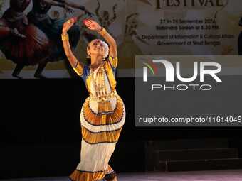 An artist performs at the Classical Dance Festival, organized by the West Bengal Government International and Cultural Affairs Department in...