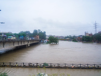 The Bagmati River floods and affects the riverbanks and homes during heavy rainfall in Kathmandu, Nepal, on September 27, 2024. (