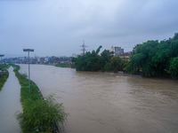 The Bagmati River floods and affects the riverbanks and homes during heavy rainfall in Kathmandu, Nepal, on September 27, 2024. (