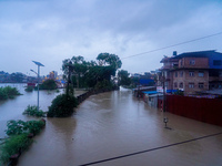 The Bagmati River floods and affects the riverbanks and homes during heavy rainfall in Kathmandu, Nepal, on September 27, 2024. (