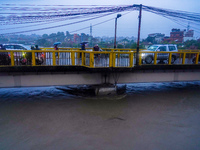 The Bagmati River floods and affects the riverbanks and homes during heavy rainfall in Kathmandu, Nepal, on September 27, 2024. (