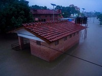 The Bagmati River floods and affects the riverbanks and homes during heavy rainfall in Kathmandu, Nepal, on September 27, 2024. (