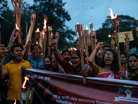 The Hindu community holds demonstrations and torchlight processions to protest the attacks, looting, vandalism, and arson targeting temples...