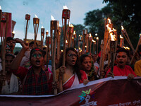 The Hindu community holds demonstrations and torchlight processions to protest the attacks, looting, vandalism, and arson targeting temples...