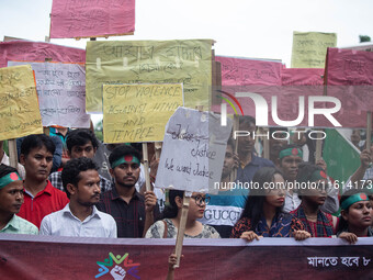 The Hindu community holds demonstrations and torchlight processions to protest the attacks, looting, vandalism, and arson targeting temples...