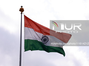 The Indian National Flag (Tri-Color) waves amid winds at the Line of Control in Kupwara, Jammu and Kashmir, India, on September 27, 2024. (