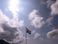 The Indian National Flag (Tri-Color) waves amid winds at the Line of Control in Kupwara, Jammu and Kashmir, India, on September 27, 2024. (