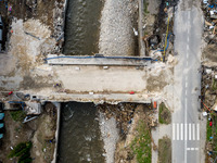 Aerial view of destroyed  buildings and a bridge as massive flooding affected tourist resorts in southern Poland - Ladek Zdroj, Poland on Se...