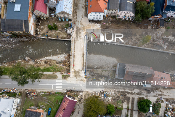 Aerial view of destroyed  buildings and a bridge as massive flooding affected tourist resorts in southern Poland - Ladek Zdroj, Poland on Se...