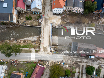 Aerial view of destroyed  buildings and a bridge as massive flooding affected tourist resorts in southern Poland - Ladek Zdroj, Poland on Se...