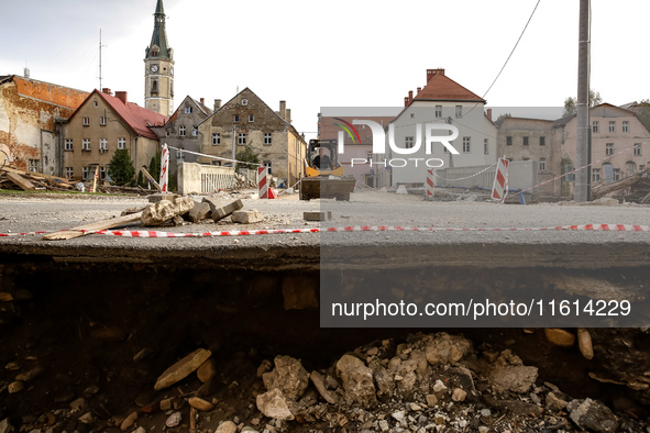 Washed out edge of a road is seen as massive flooding affected tourist resorts in southern Poland - Ladek Zdroj, Poland on September 27, 202...